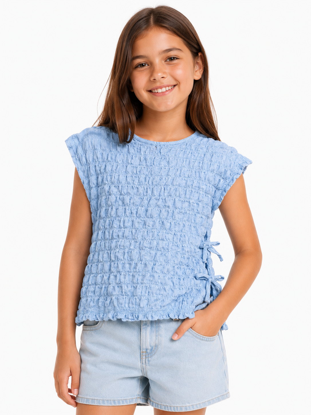 Blusa texturizada celeste / Talla 9 años